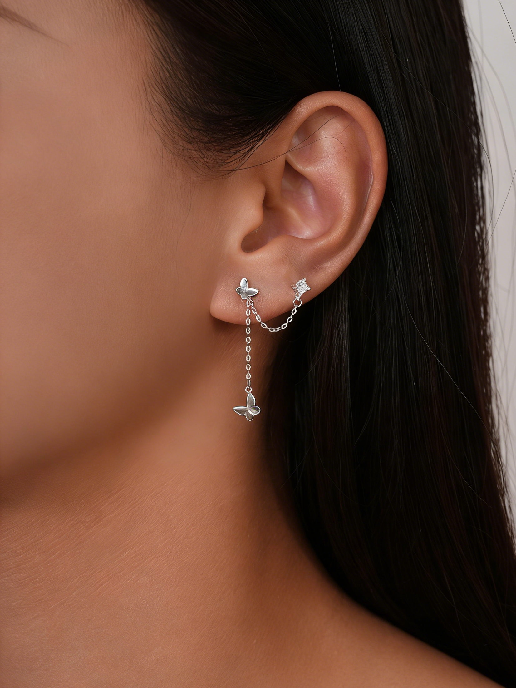 S999 Silver Butterfly Chain Earrings